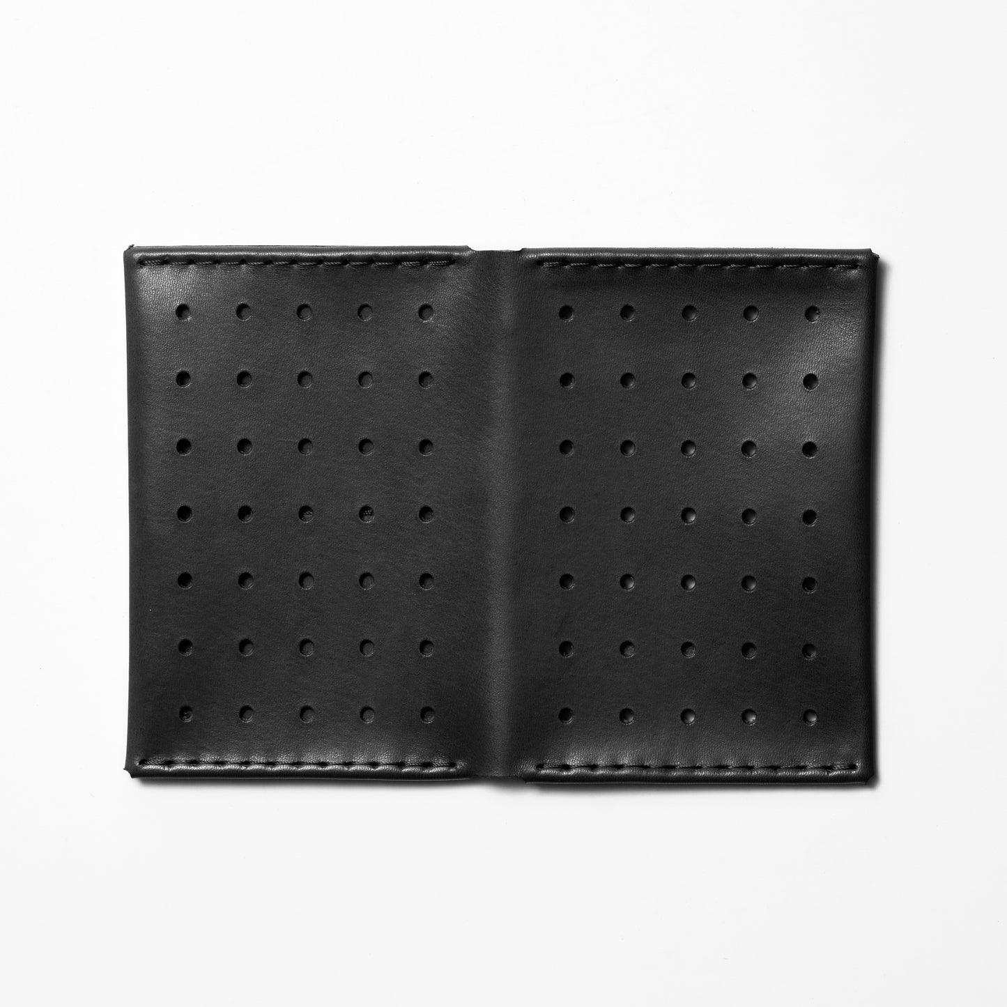 PERFORATED PASSPORT CASE